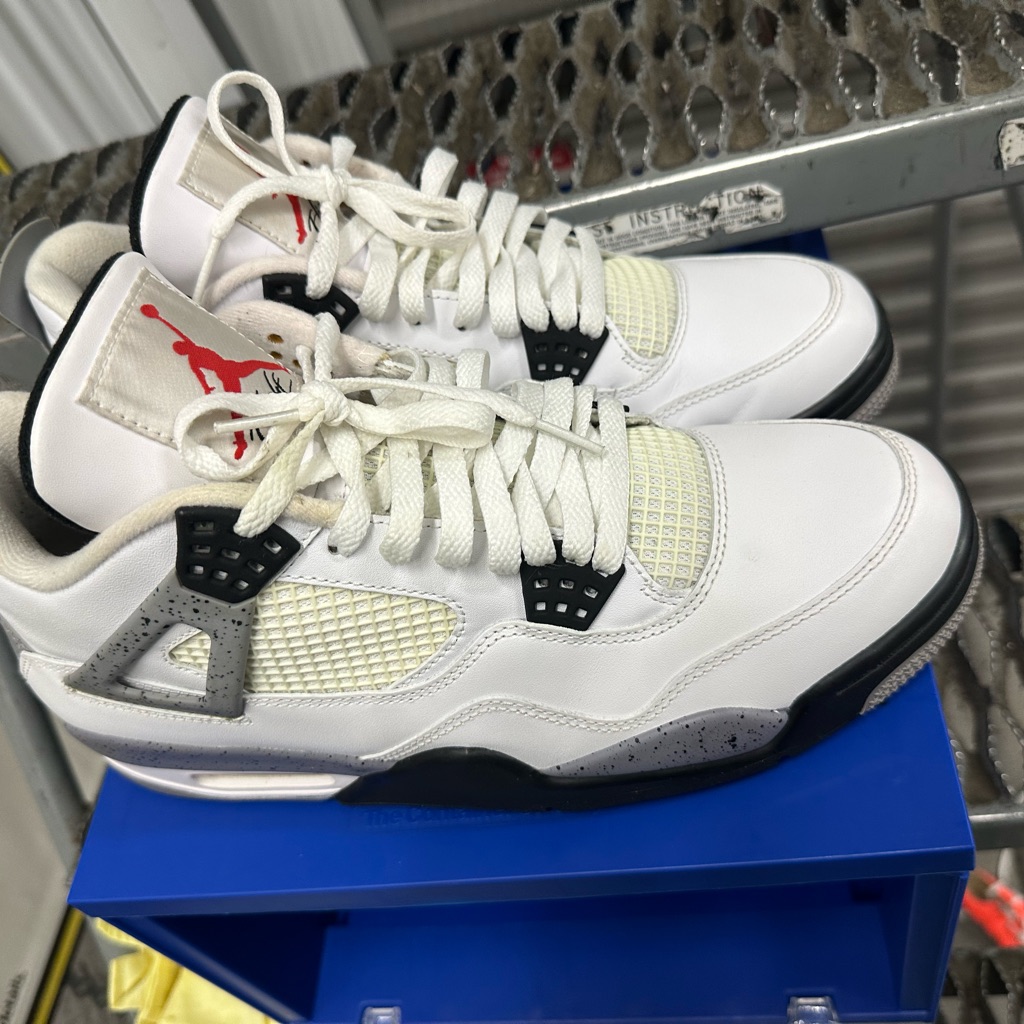 Jordan White And Black Air Jordan 4 Sneakers